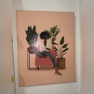 Cozy Woman in Pink Armchair Wall Art